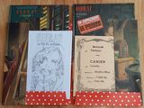 three books that are sitting on a table