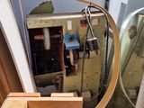 a picture of a machine that is working on a piece of wood