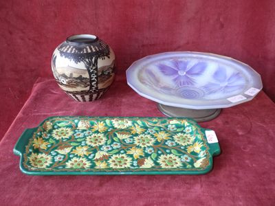 two vases and a platter on a table
