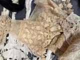 many different types of laces on a bed