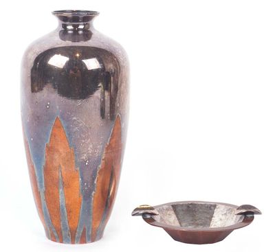 a vase and a bowl sitting next to each other on a white surface
