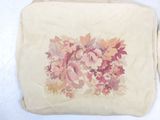 a bag with a floral design on it sitting on a table