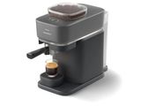 une image représentant une cafetière et une tasse de café