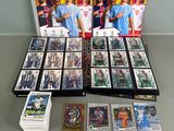 a group of cards and dvds sitting on top of a table