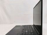 the back of a laptop computer sitting on top of a white surface