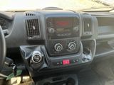 a picture of a dashboard of a truck with the controls on