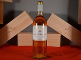 a bottle of wine that is sitting on a table