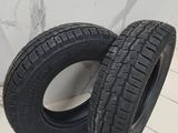 a pair of tires sitting on top of a tiled floor