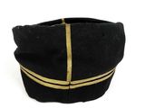 a close up of a black hat with gold stripes on it
