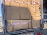 a truck that has a lot of boxes in the back