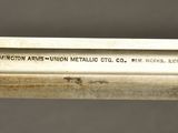 a close up of a metal object with writing on it