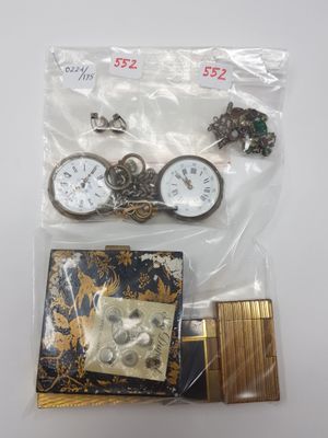 several items including a pocket watch, a lighter, and a lighter