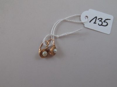 a picture of a gold and pearl necklace with a price tag