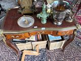 a table with a lot of items on it in a room