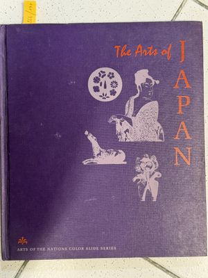 a purple book that has a picture of a dog and a cat on it