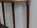 an image of a small table with a drawer on it
