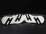 two black and white shoes with the word flash printed on them