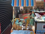 many items for sale at the outdoor market