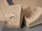 two pieces of stone that are sitting on a table