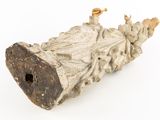 a piece of wood that has been carved into a piece of wood