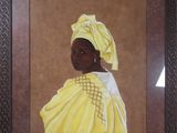 tableau représentant une femme coiffée d'un turban, dans un cadre marron