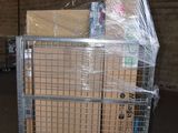a metal cart with boxes on top of it in a warehouse