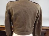 an image of a military jacket on a mannequin