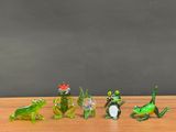 many figurines that are sitting on a table