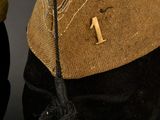 a hat with a number on it and a hat with a number on it