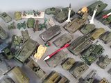 a lot of military toys that are on a table