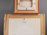 an image of a box with a painting inside of it
