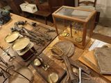 a wooden table topped with lots of tools on top of it