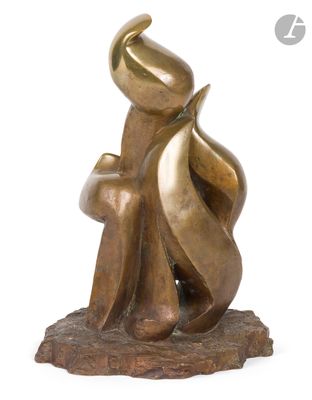 bronze sculpture of a man and a woman sitting on a rock