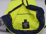 a yellow vest with a blue strap on it and a cell phone in it