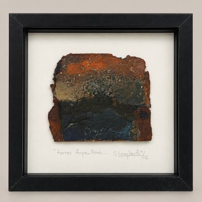 a picture of a piece of art that is in a black frame