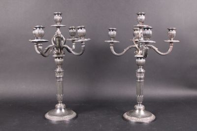 pair of antique silver plated candelabs on stands