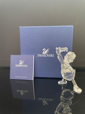 figurine en cristal Swarovski représentant un homme tenant une batte de baseball