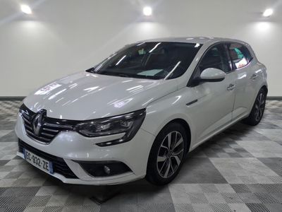 the white car is parked on a checkered floor in the garage