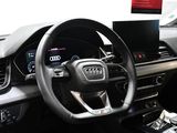 steering wheel and dashboard of a car in a showroom