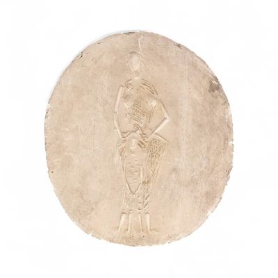 une image représentant une pièce de monnaie sur laquelle figure une femme