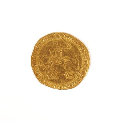 l'image d'une pièce d'or sur laquelle figure l'image d'un homme