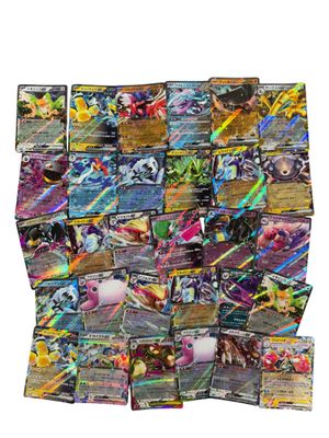 a pile of pokemon trading cards sitting on top of each other