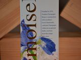a box of toothpaste on a wooden table