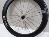 a bicycle wheel with a sticker on the side of it