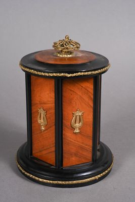 an image of a small wooden table with a clock on top of it