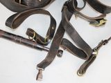 a lot of leather items that are on the table