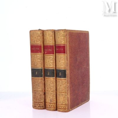 three books that are sitting on top of each other
