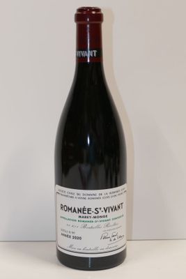a bottle of wine that is sitting on a table