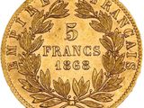 a gold five frans coin with a laurel wreath on it