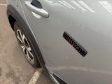 a close up of a car with a sticker on it